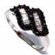 Bague argent rhodiee 1,8g t50 à 60 zircons noirs et blancs