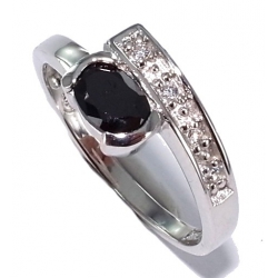 Bague argent rhodiee 1,8g t50 à 60 zircons noirs et blancs