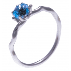 Bague argent rhodié et  topaz bleu clair